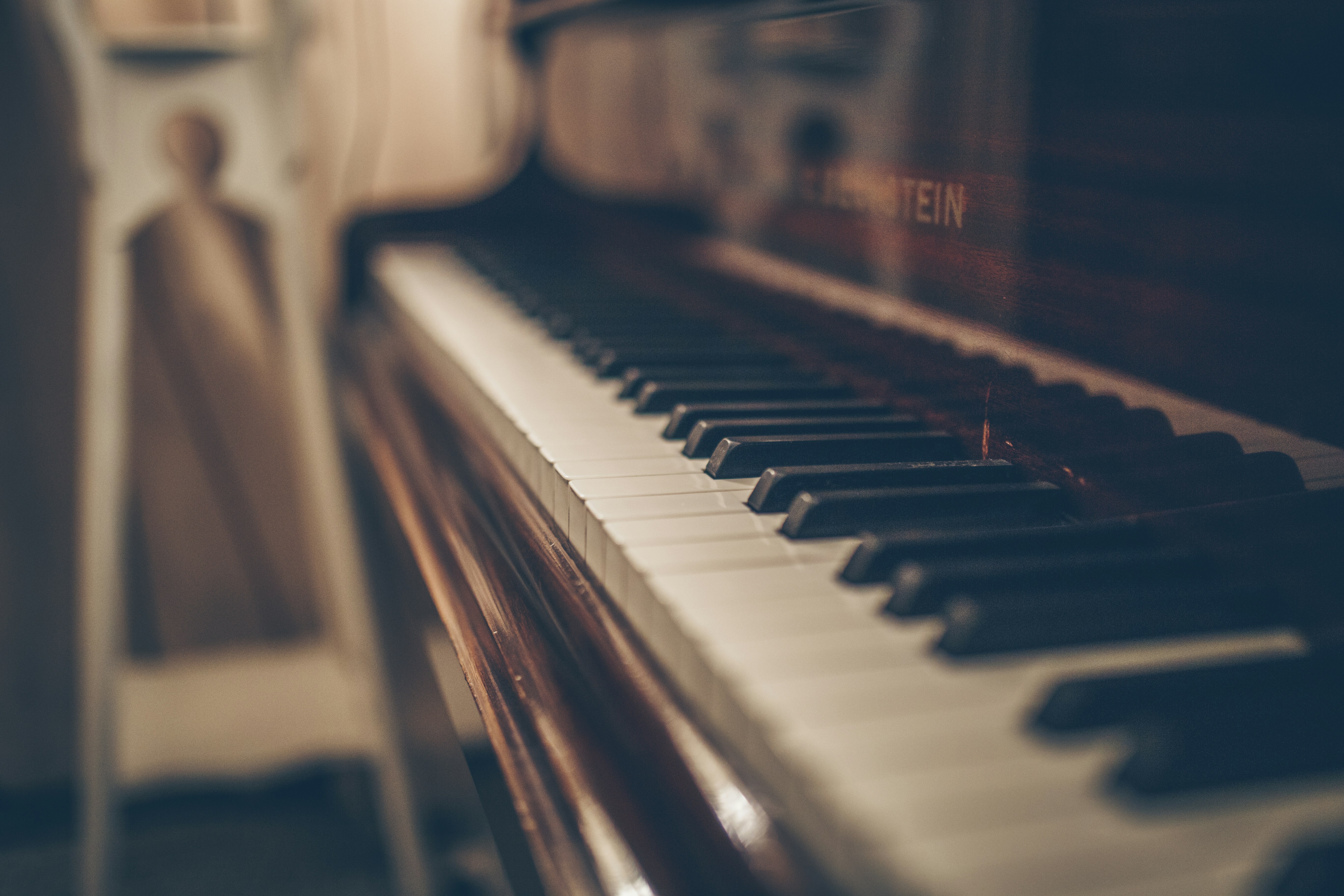 Piano keys in soft light.
